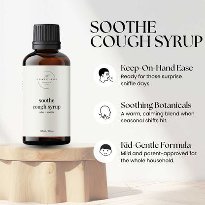 Soothe Cough Syrup bottle on a wooden stand with product features and benefits listed.