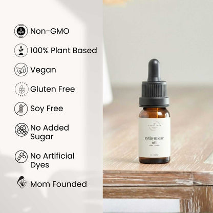 Bottle of rythym ear oil with certification icons on a white background